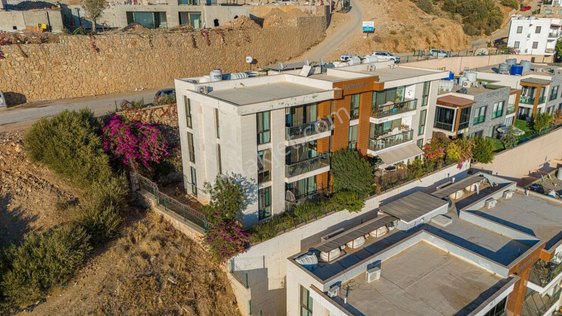 Bodrum Çırkan Satılık Daire  Panoramik Deniz Manzaralı,100m2 Bahçeli 2+1 Modern Satılık Daire