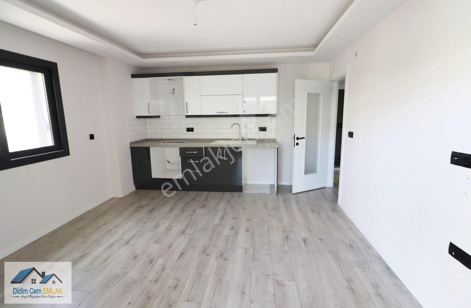 Didim Yeni Satılık Daire DİDİM CEM EMLAK'TAN ASANSÖRLÜ BİNADA ARA KATTA SATILIK 2+1 DAİRE