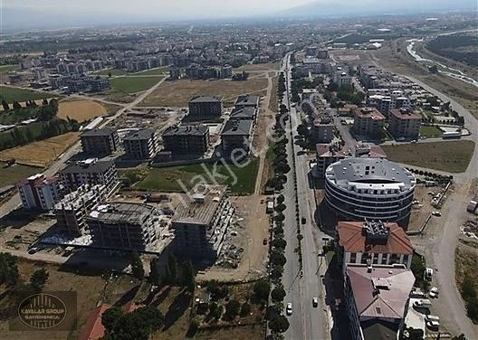 Burhaniye Bahçelievler Satılık Ticari İmarlı KAYALAR'DAN BURHANİYE ÖREN YOLUNDA 75 DAİRELİK EMSALSİZ ARSA