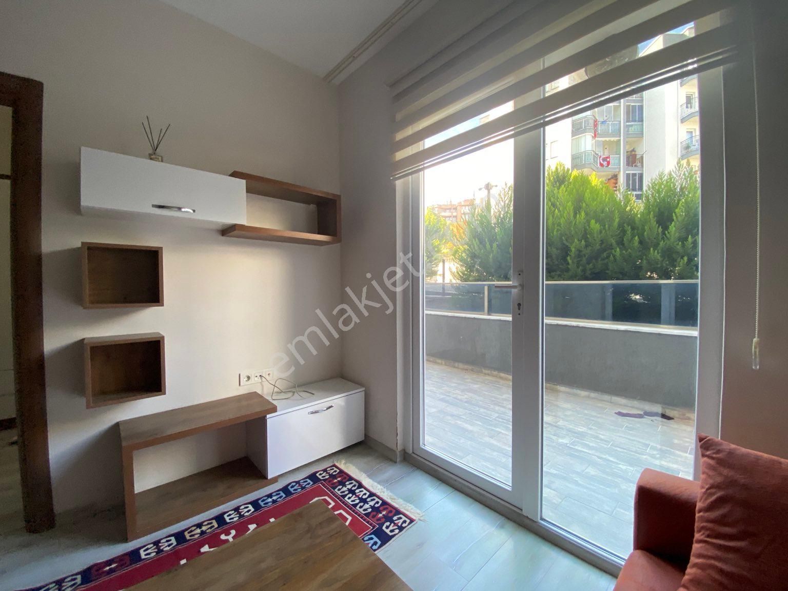 Bursa Nilüfer Bahçe Katı Kiralık Daire  PERA'dan lüks sitede geniş balkonlu 2+1 eşyalı zemin kat daire