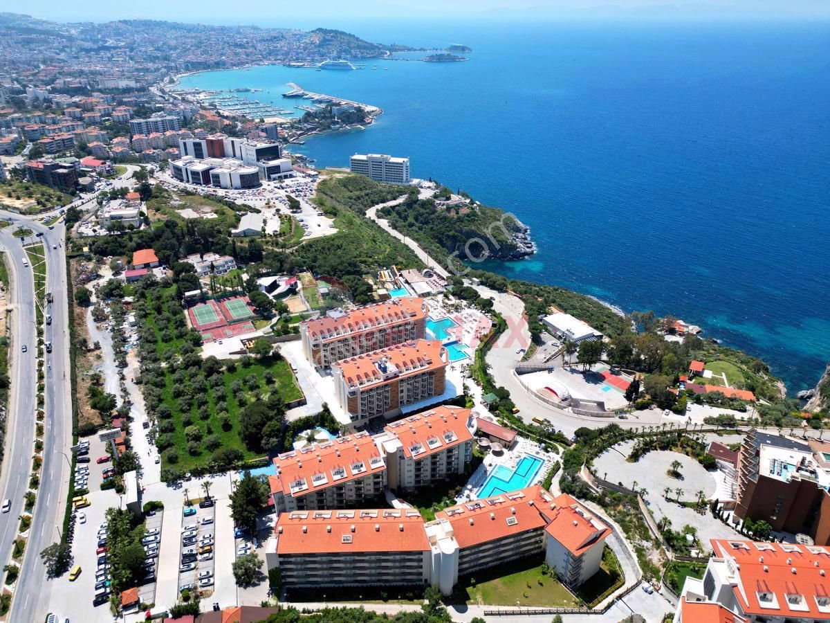 Kuşadası Türkmen Satılık Daire Ramada Hotel'de Havuz Manzaralı Köşe Bahçe Katı 1+1