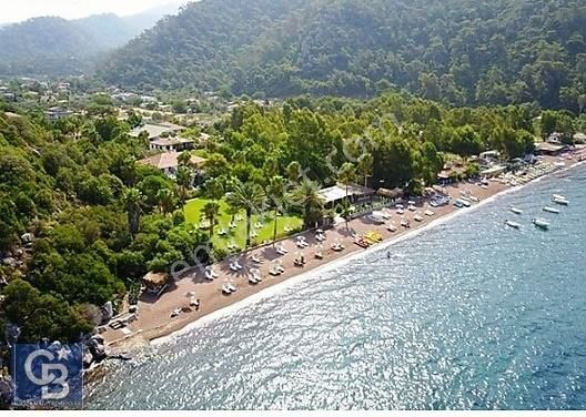 Marmaris Hisarönü Satılık Turizm İmarlı Hisarönü Plaj Yoluna Cephe Taş Duvarlı 1950 M2 Emsalsiz Arazi