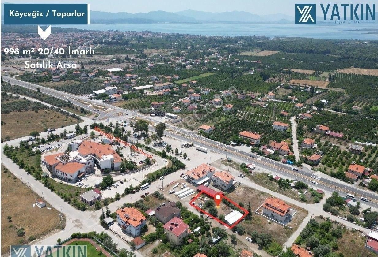 Köyceğiz Toparlar Satılık Konut İmarlı Köyceğiz Toparlar'da Emsalsiz Konumuyla 20/40 İmarlı 998 M² Satılık Arsa