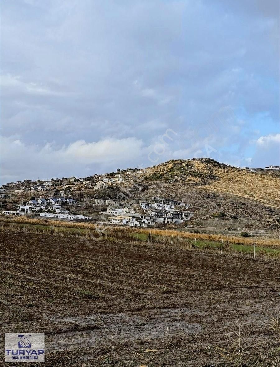 Foça Yenibağarası Satılık Tarla Turyap'tan Satılık Tek Tapu Etrafı Tel Örgü İle Çevrili Tarla