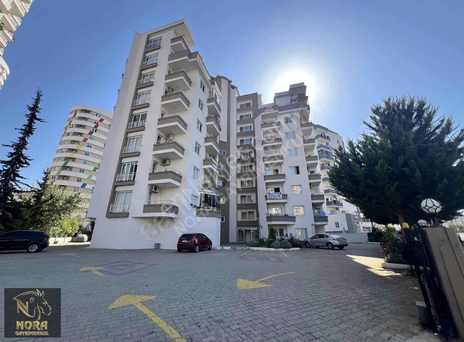 Yenişehir Çiftlikköy Satılık Daire Nora'dan Üni. Caddesinin Göbeğinde Site İçi Satılık 1+1 Daire