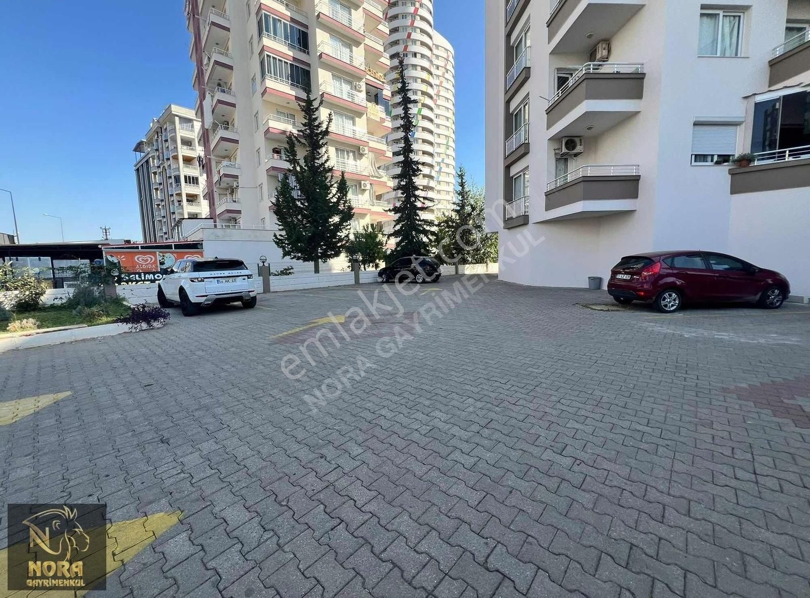 Yenişehir Çiftlikköy Satılık Daire Nora'dan Merkezi Konumlu Hazır Kiracılı Masrafsız