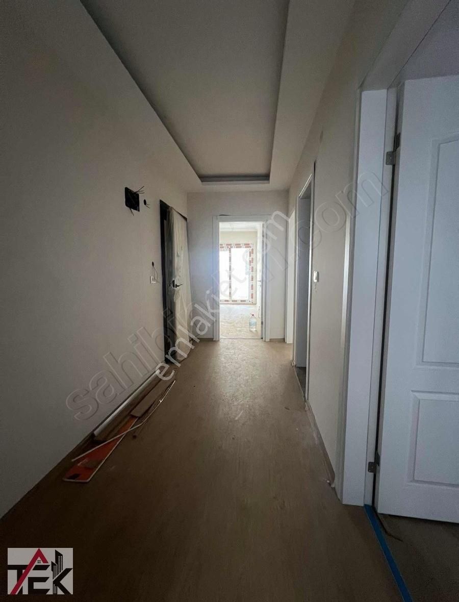 Bayraklı R. Şevket İnce Satılık Daire Bayraklı Şehir Hastanesi Karşısı Sıfır Ara Kat 90 M2 Daire