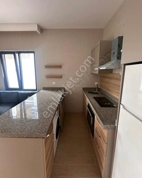 Nilüfer Dumlupınar Kiralık Daire Baştürk Gayrimenkul'den Oruç Bulvarda Kiralık 1+1 Bahçe Katı