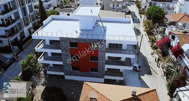 Milas Güllük Satılık Daire Bodrum Güllük'te Denize Sıfır Manzaralı Konsept Daire