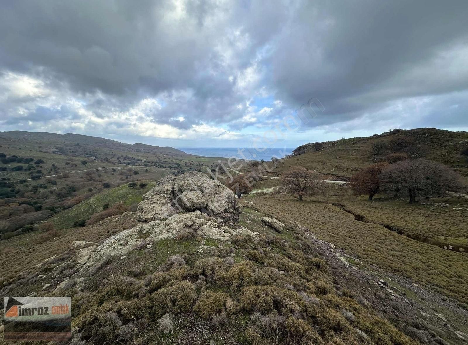 Gökçeada Eşelek Köyü Satılık Tarla İmroz Emlak'tan Güzelcekoy'da Yol Kenarı 2.920 M2 Tarla