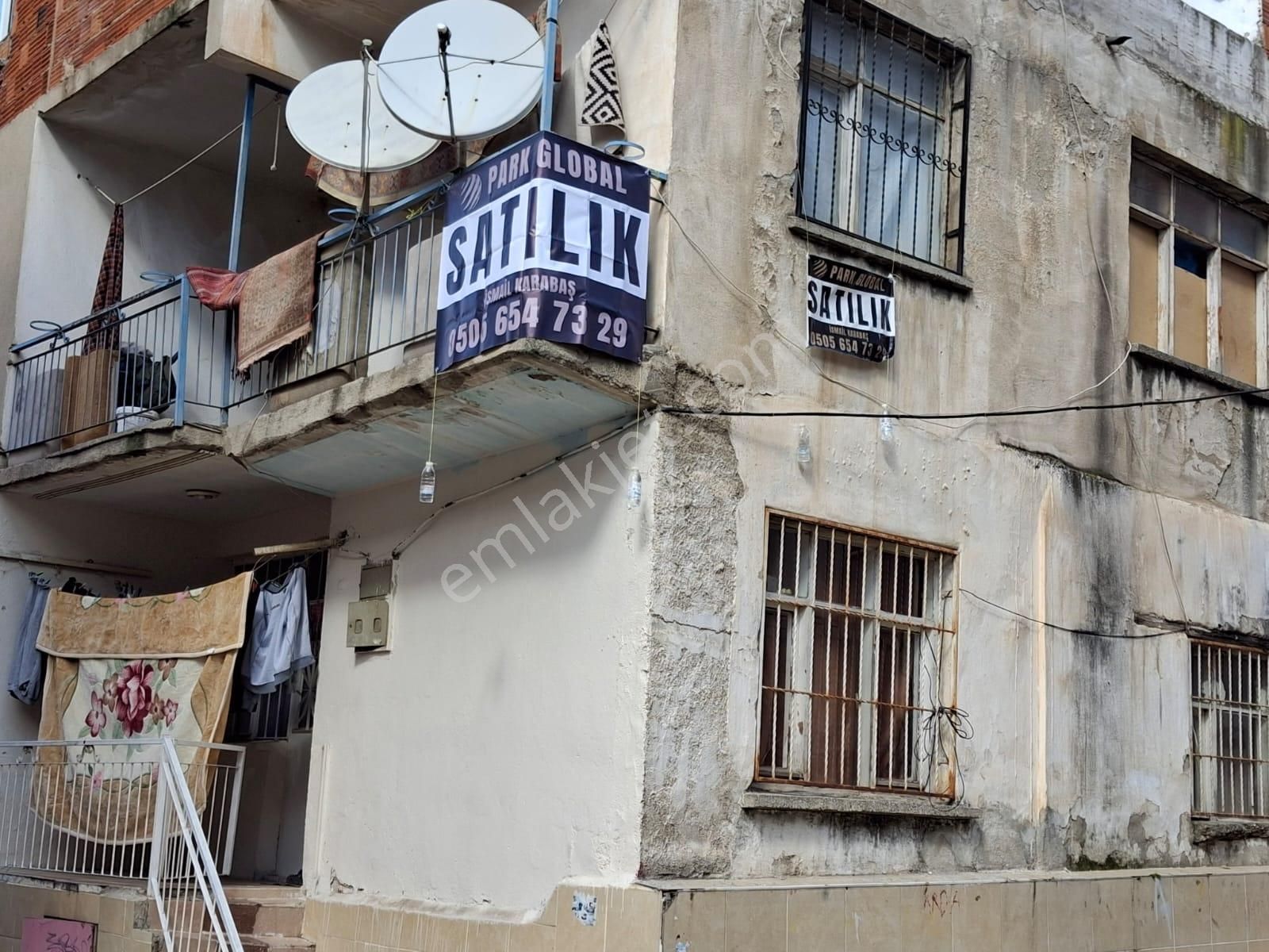 Satılık / İzmir İli Bayraklı İlçesi Yamanlar Mah.müstakil Arsalı Ev
