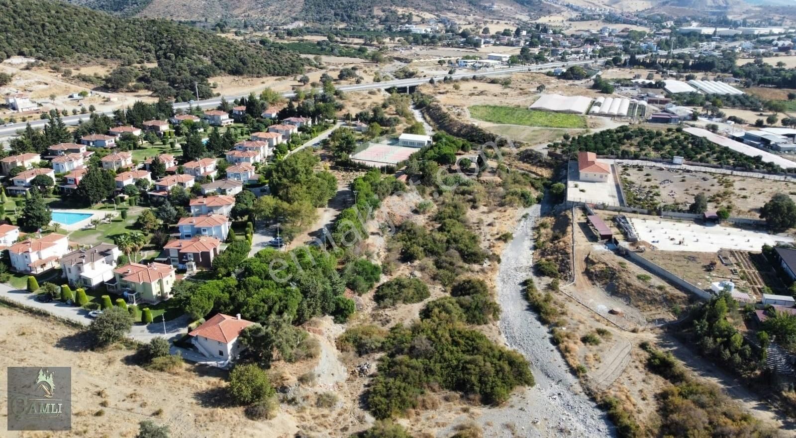 Güzelbahçe Çamlı Satılık Tarla Çamlı Gayrimenkulden Villalar Bölgesinde Satılık Arazi