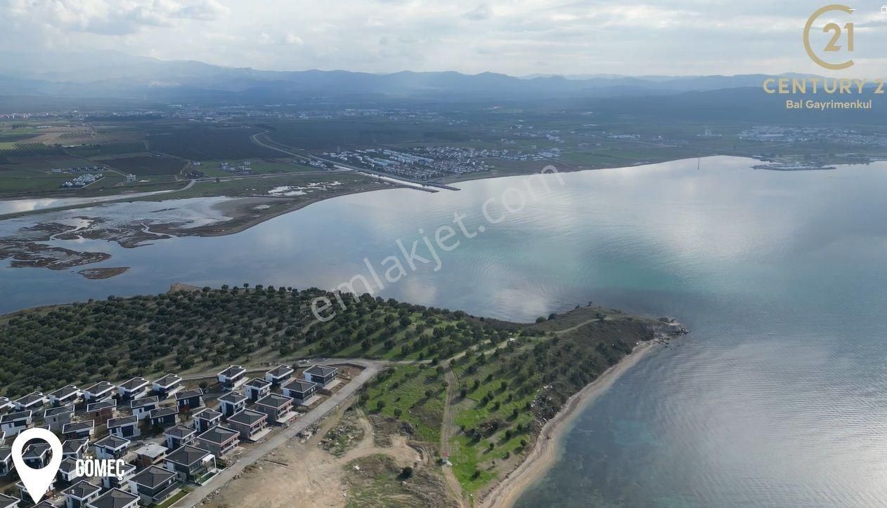 Gömeç Kemalpaşa Satılık Konut+Ticaret Alanı Gömeç Kemalpaşa'da Satılık, Denize Sıfır, Ticari Ruhsatlı Arsa