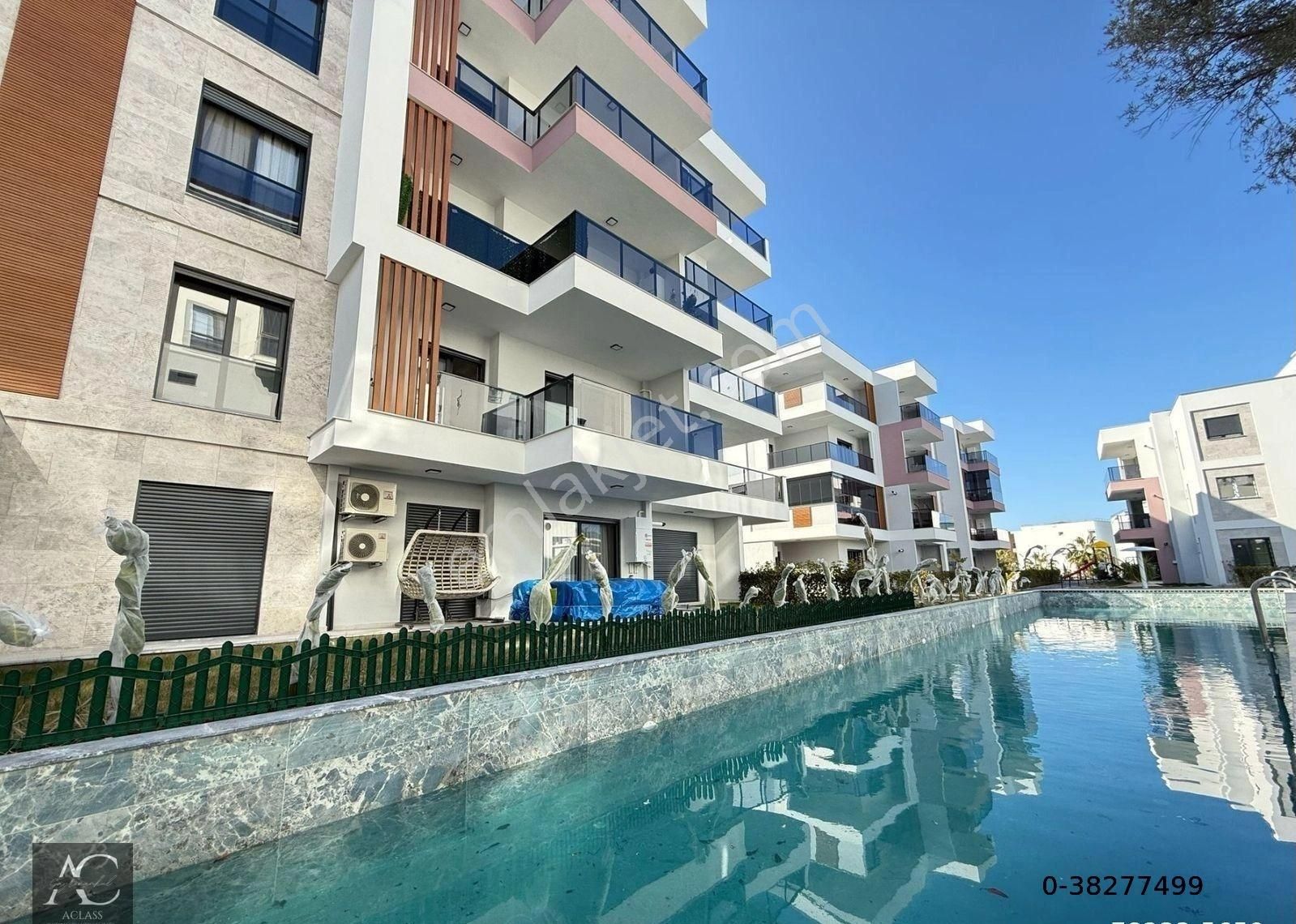 Kuşadası İkiçeşmelik Satılık Residence Merkezi Konum-7/24 Guvenlık-acık/kapalı Havuz-otopark-hamam-sauna-yerden Isıtma-yeni-lüx-1+1