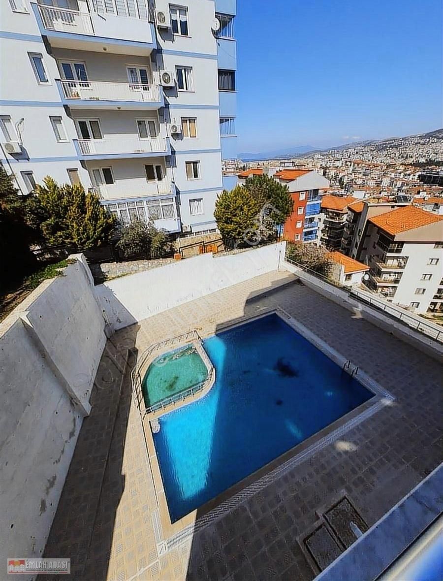 Kuşadası Kadınlar Denizi Satılık Daire Emlak Adasından 2+1 Havuzlu Deniz Manzaralı Full Eşyalı Daire