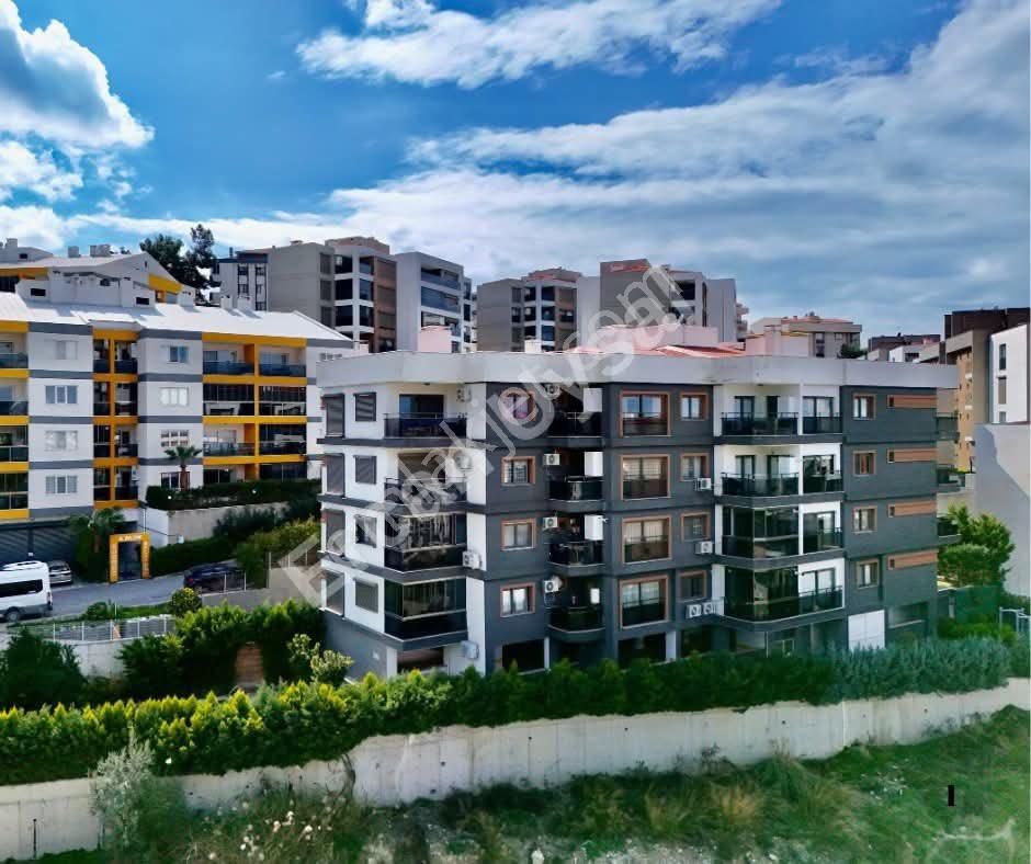 Kuşadası İkiçeşmelik Satılık Daire Views Emlak’tan Kuşadasında Havuzlu Sitede Arakat 2+1 Manzaralı