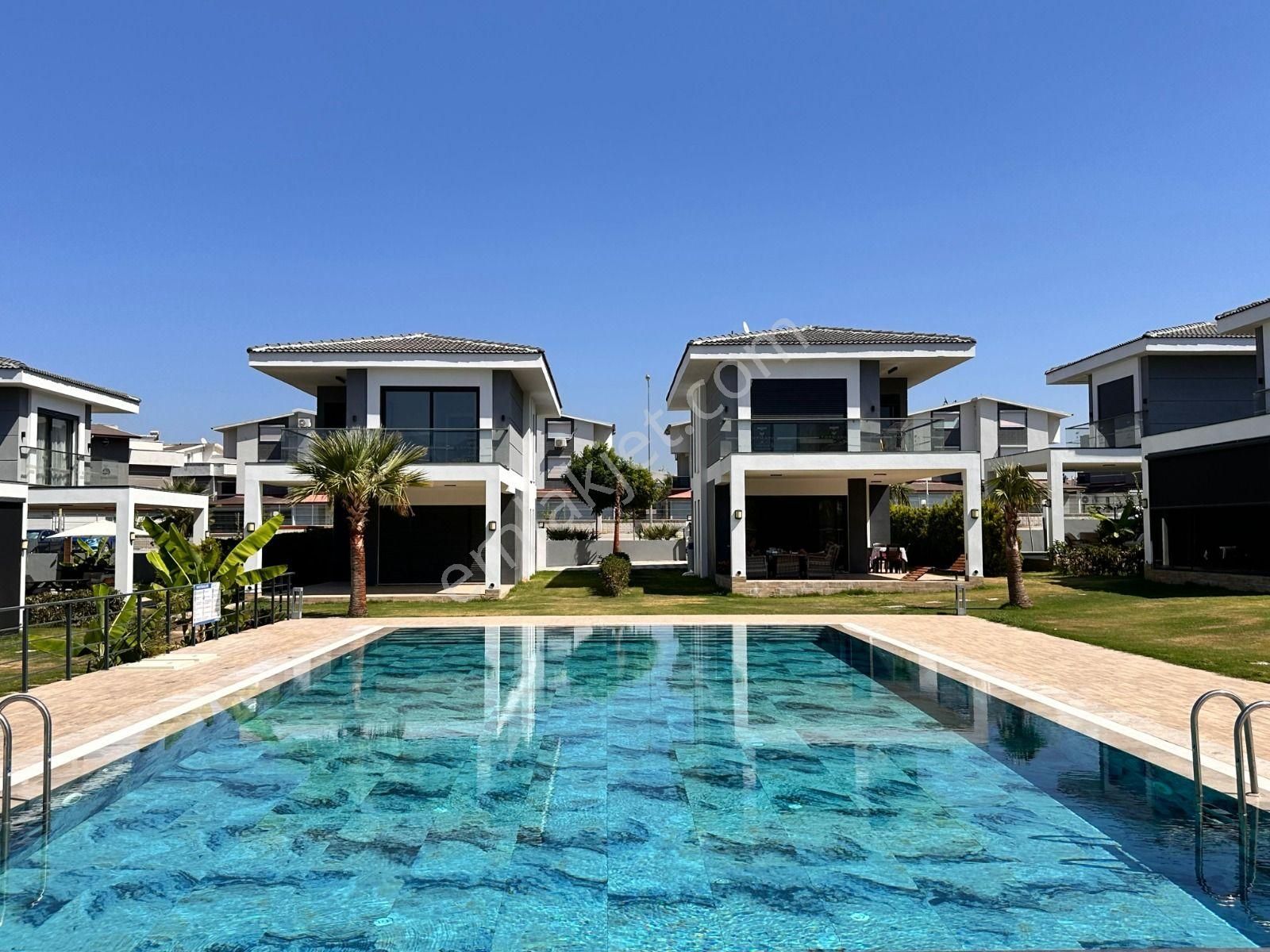 Kuşadası Güzelçamlı Satılık Villa Kuşadası'nda Güvenlikli, Havuzlu Satılık 3+1 Müstakil Villa