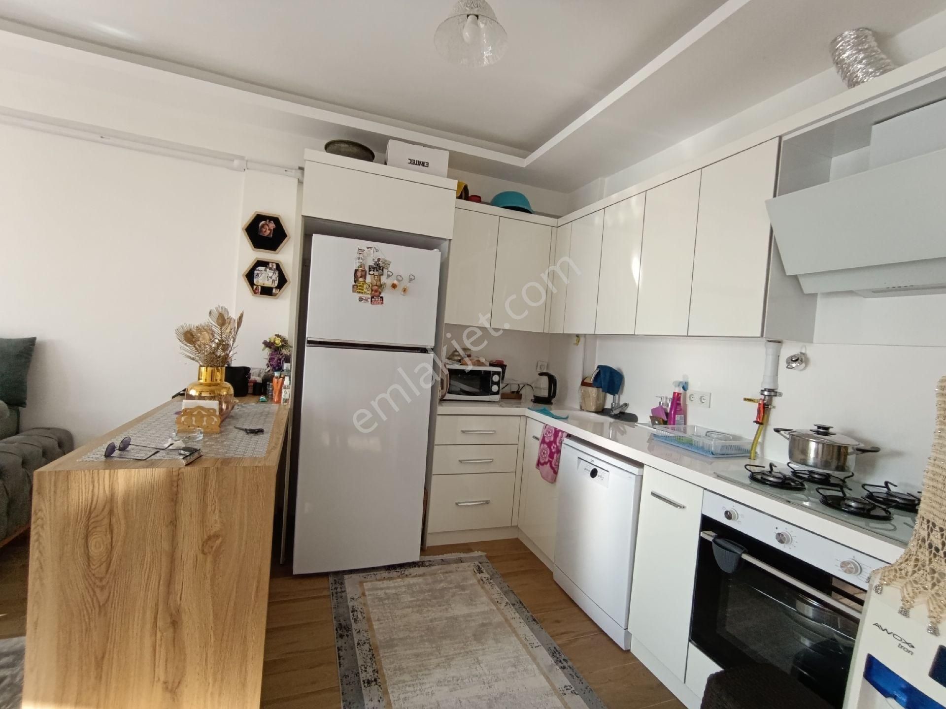 Kuşadası'nda Havuzlu Sitede Doğalgazlı 1+1 Daire - Görsel 10