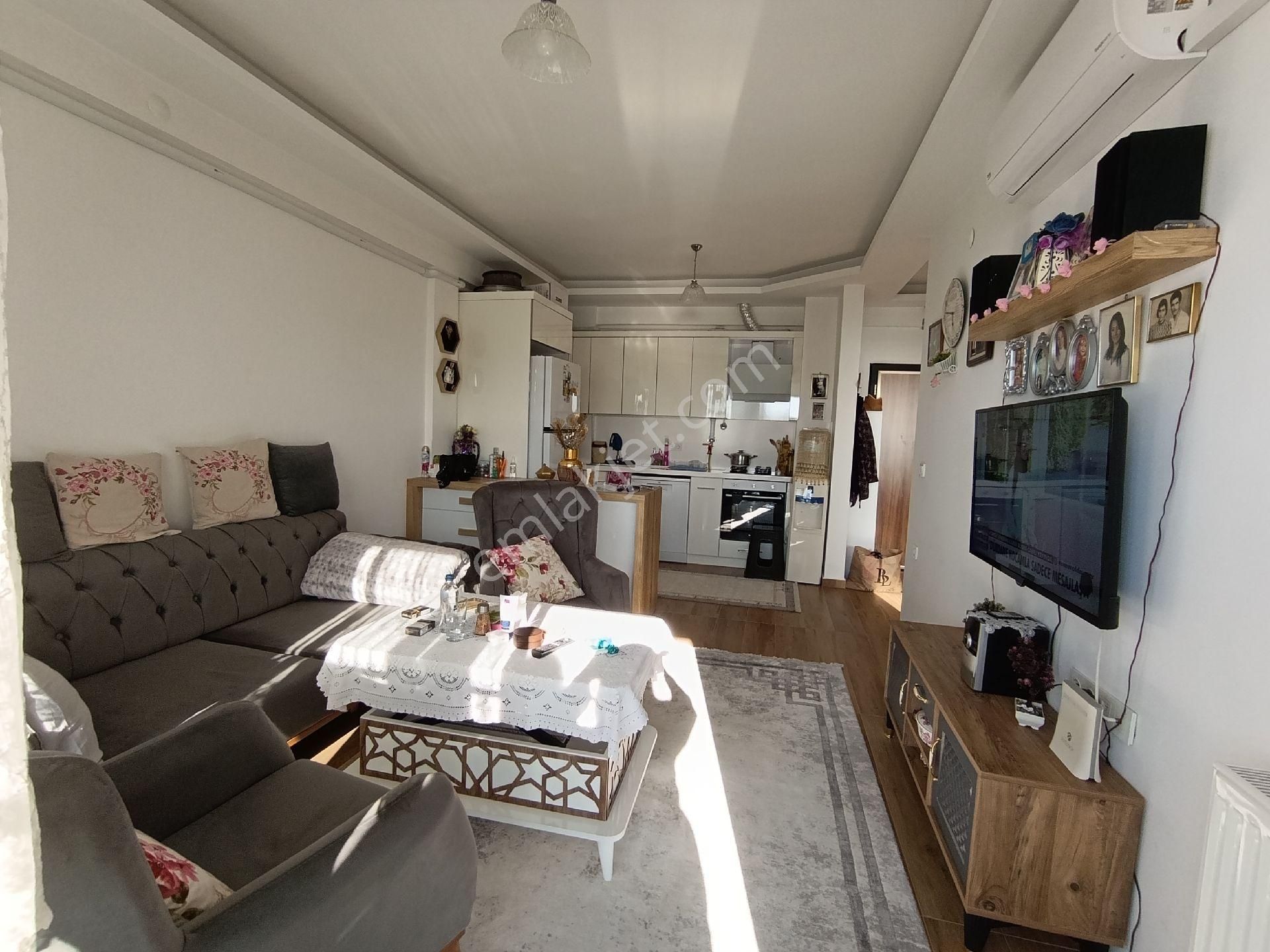 Kuşadası'nda Havuzlu Sitede Doğalgazlı 1+1 Daire - Görsel 14