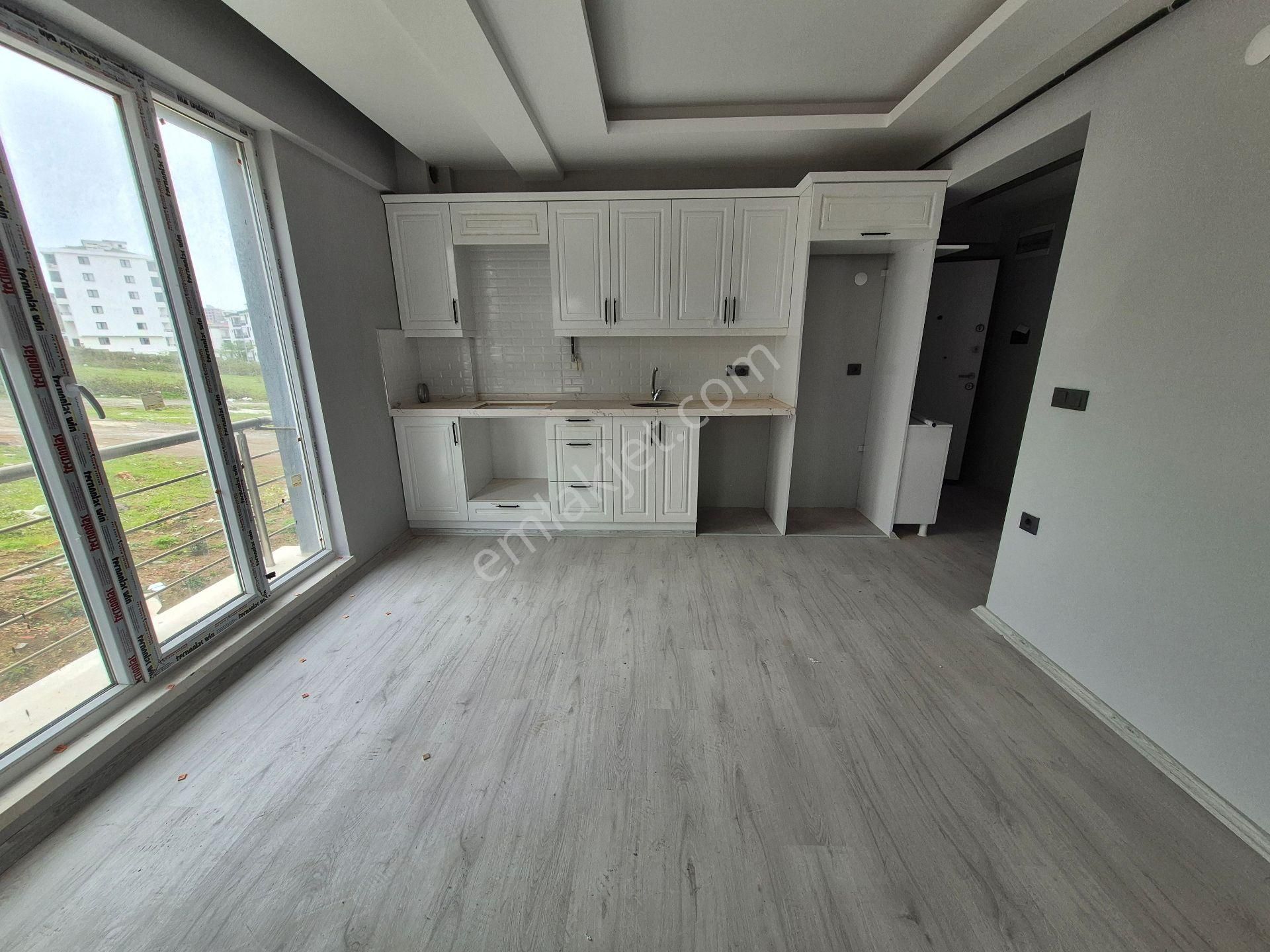 Atakum Körfez Toplu Konut Bulvarında Kiralık 1+1 Daire (1.kat)