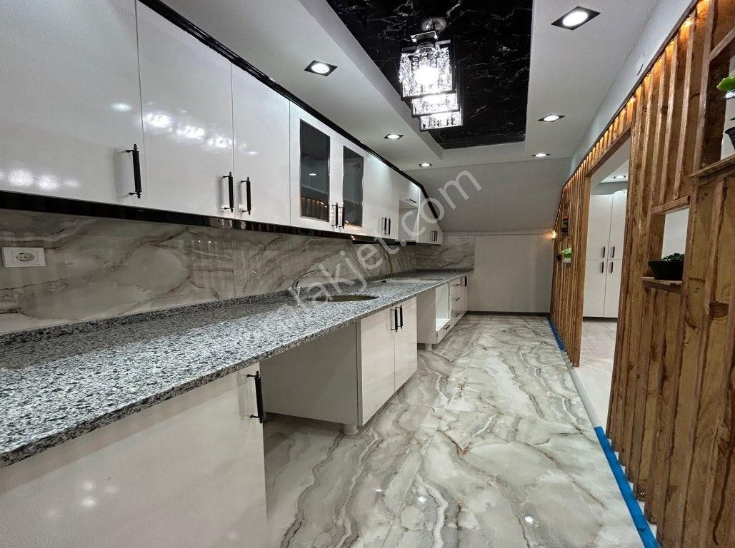 Başkent Yapı'dan Şık Tasarımlı 3+1 Kış Bahçeli Bahçe Katı