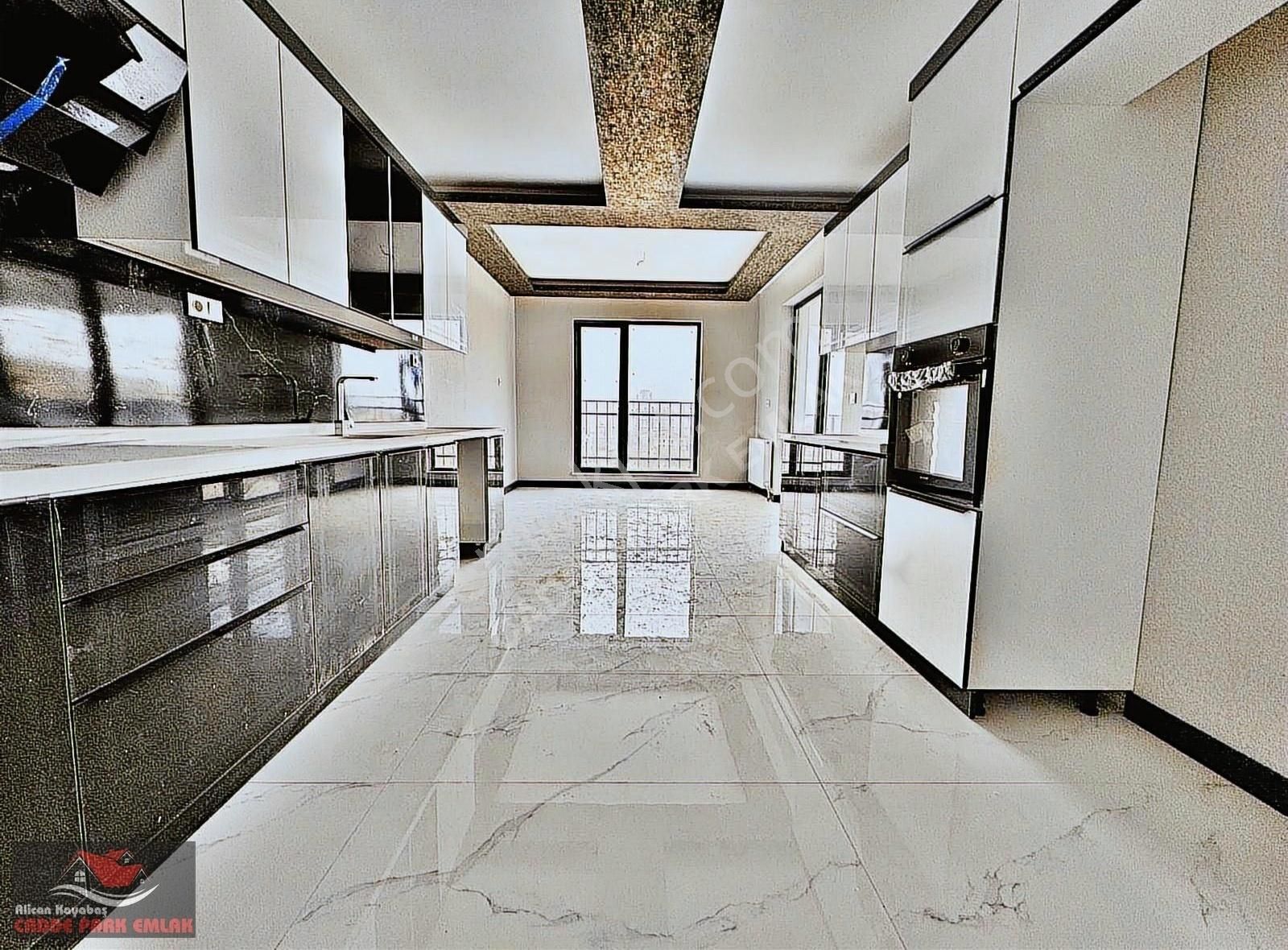 Ovacık_merkez'de_oturuma_hazır_geniş_metrajlı_site_içi_4+1_215m²