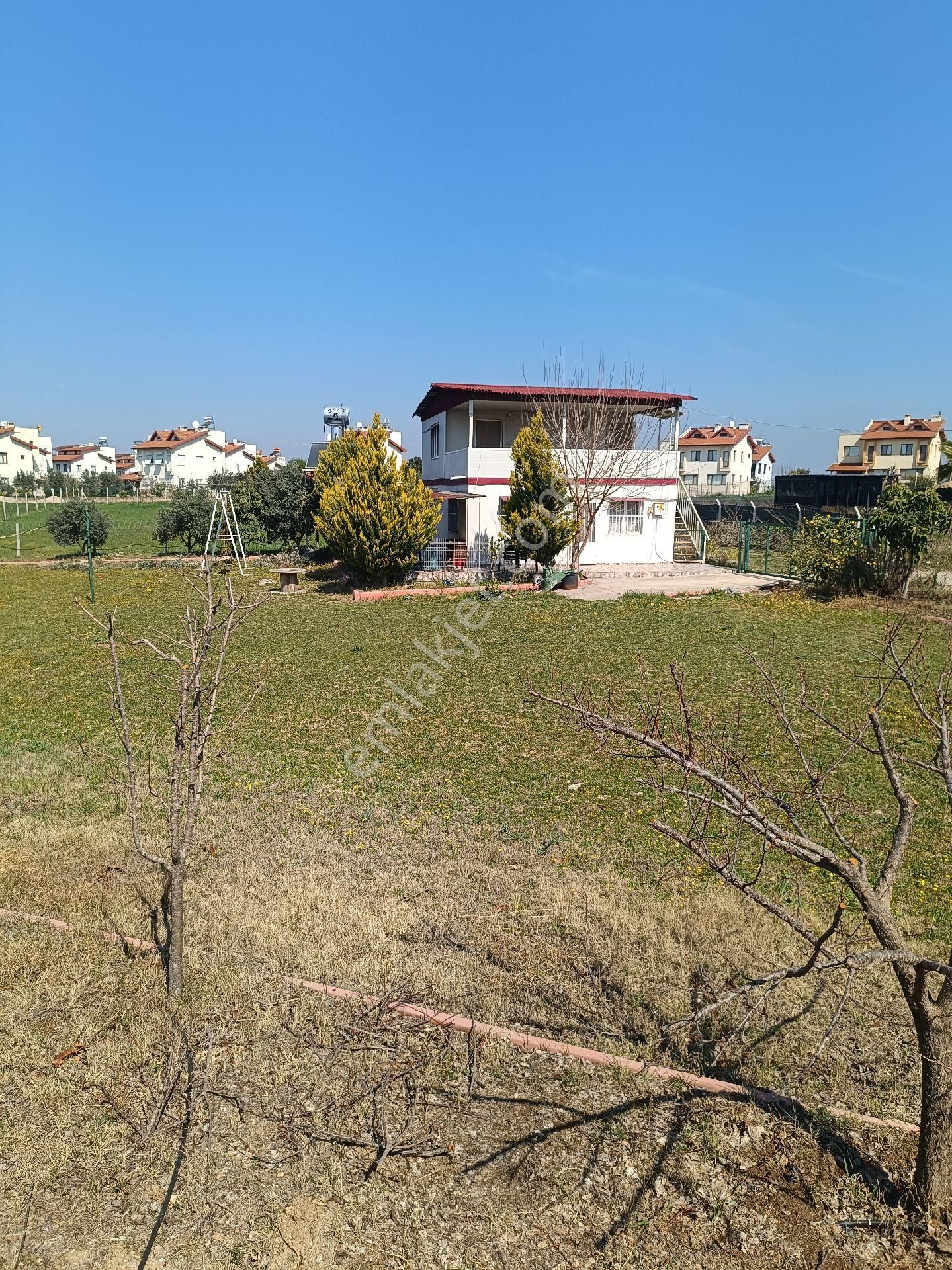 Menekşe'de Yola Cepheli Müstakil Tapulu Arsa
