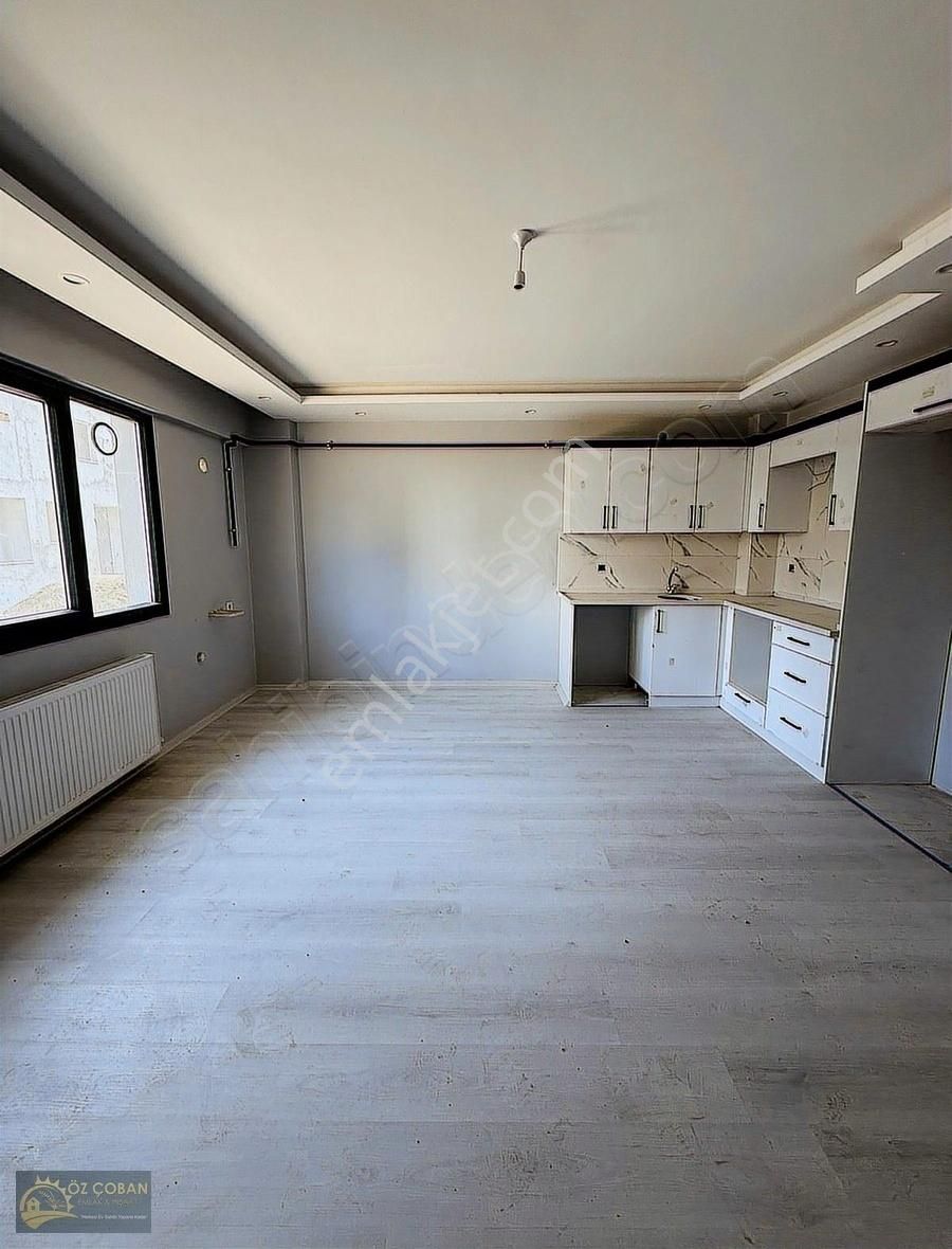 Öz Çoban Gayrimenkul'den 1+1 Prim Garantili 90m2 Sıfır Daire