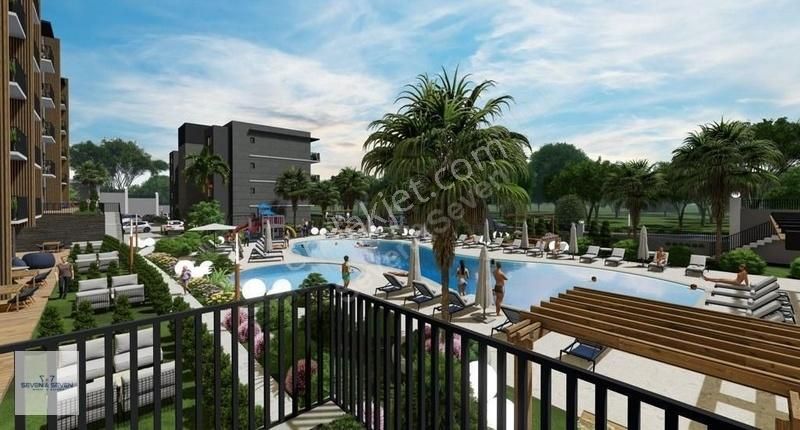 Kuşadası Ege Mahallesi'nde Deniz Manzaralı 1+1 Satılık Daire