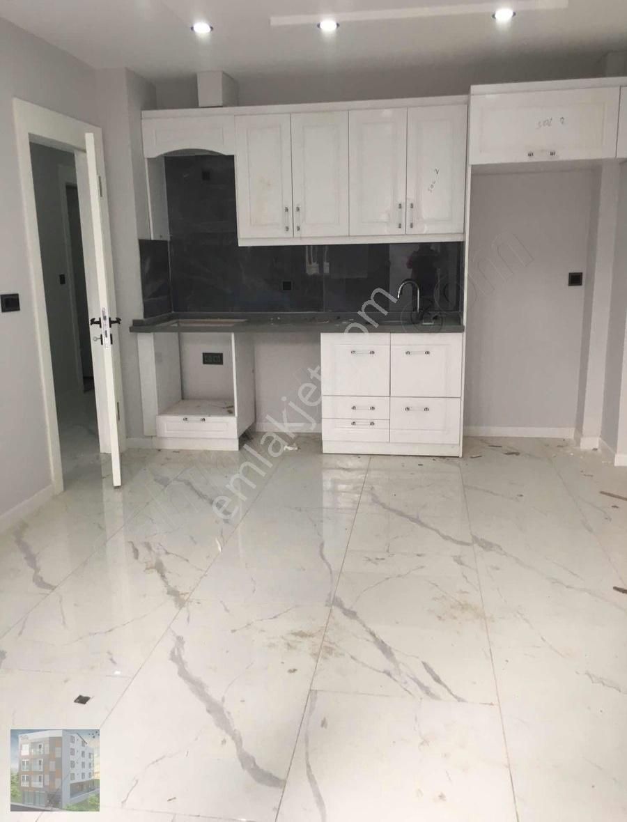 Kuşadası Davutlarda Merkezde Satılık 2+1 Daire