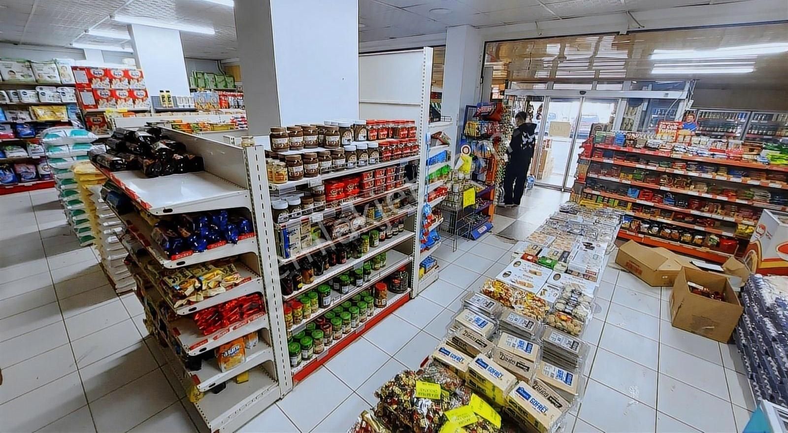 Lotus Tan Cadde Üzeri Kupon Market - Görsel 3