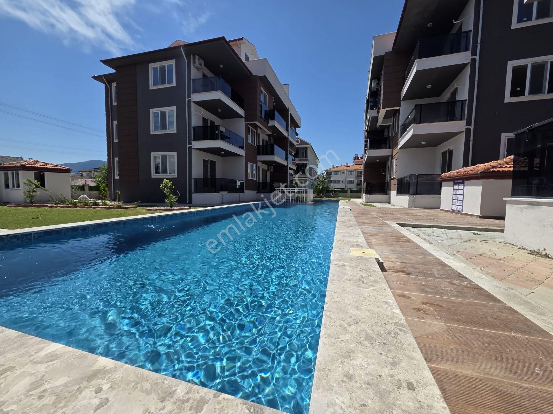 Dalaman Altıntas’ta Havuzlu Site’de 1+1 Daire Kiralık