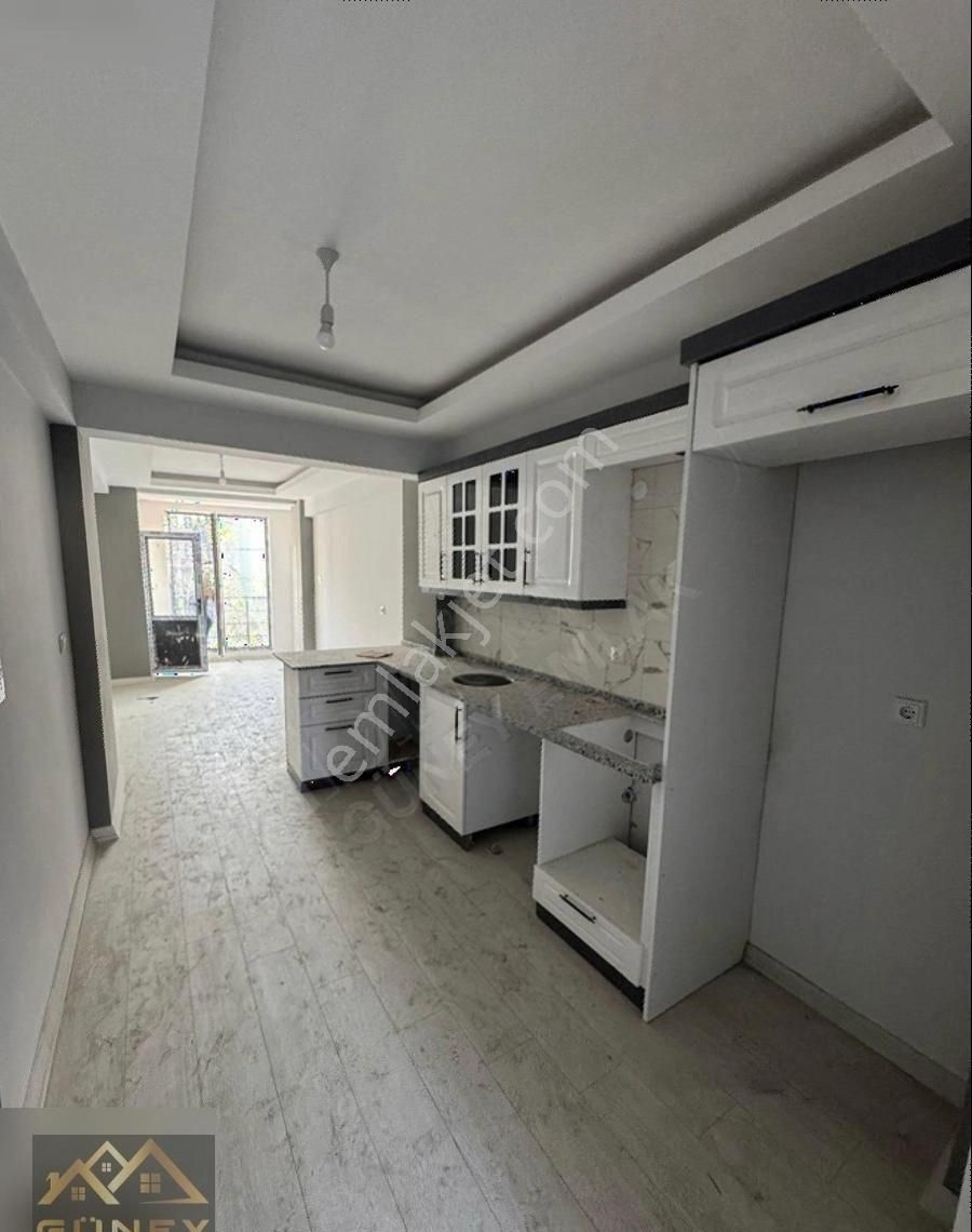 Güney Emlak Gayrimenkulden Şehir Merkezinde Satılık 1+1 Daireler
