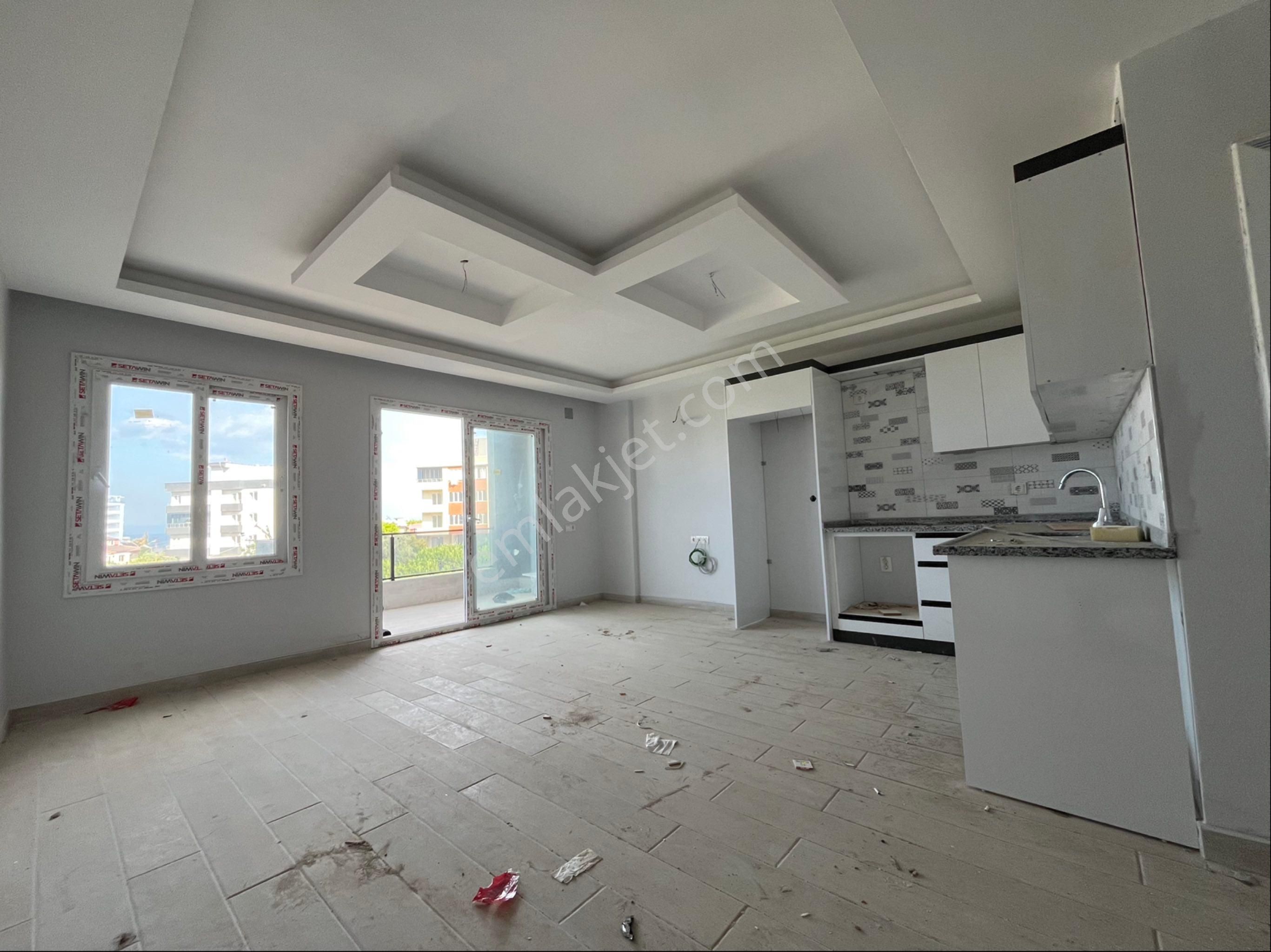 King’den Kocahasanlı’da Deniz Manzaralı 2+1 Kupon Daire