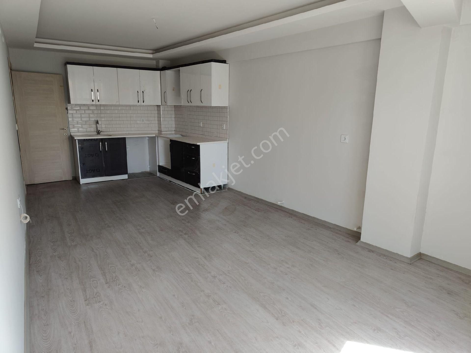 Kuşadası Davutlar Merkezde Sıfır Yapı 2+1 Daire
