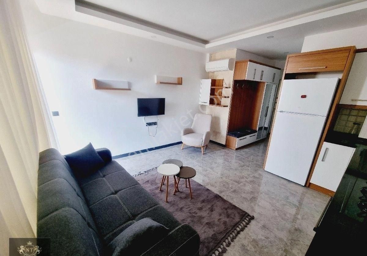 Kuşadası Merkezde Full Eşyalı Satılık Sıfır 1+1 Daıre