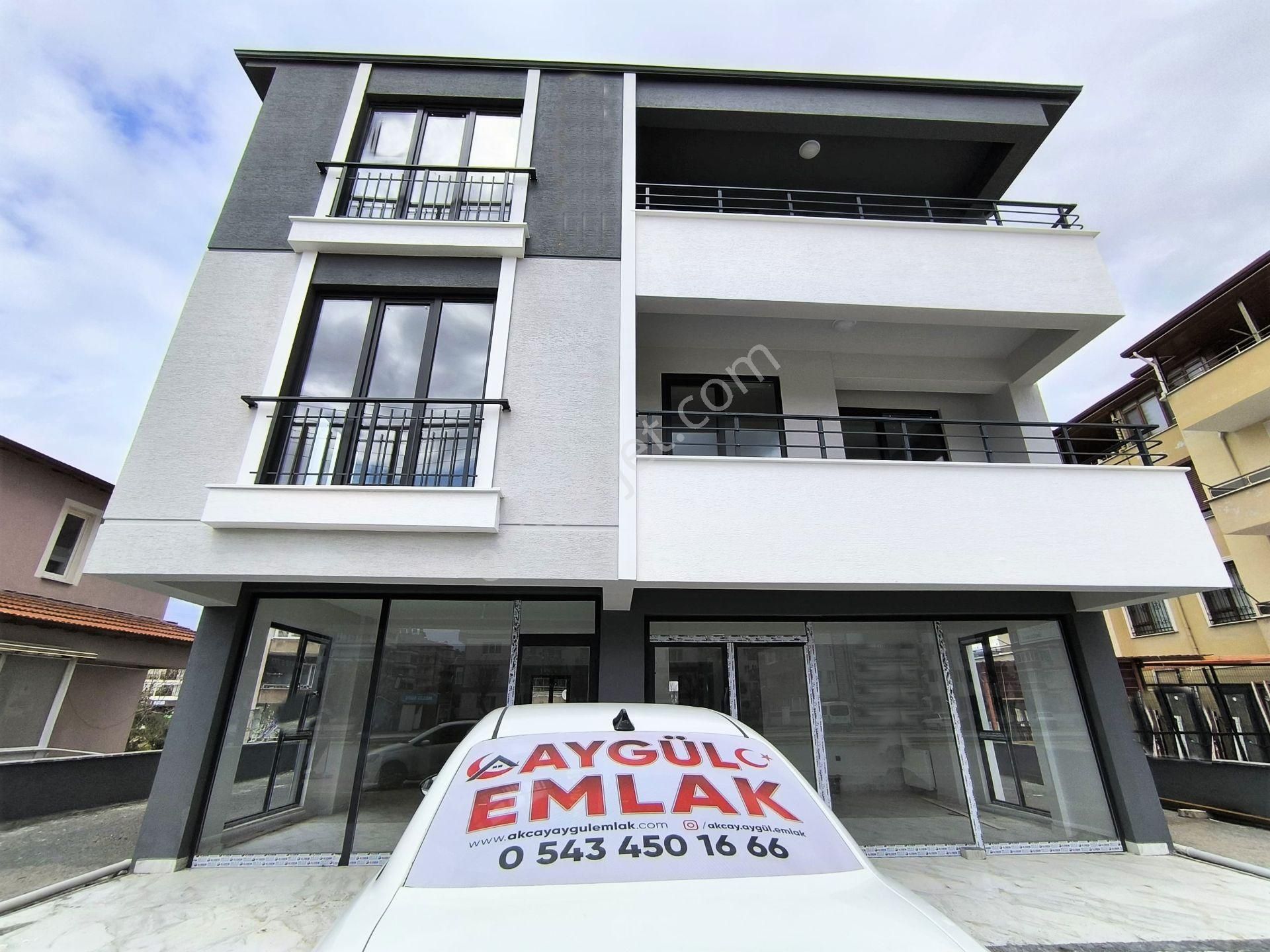 Burhaniye'de Aygülden Sıfır 2 Katlı Bina'nın 2.katı Ön Cephe Geniş Balkonlu Kaçmaz 2+1 Satılık Daire