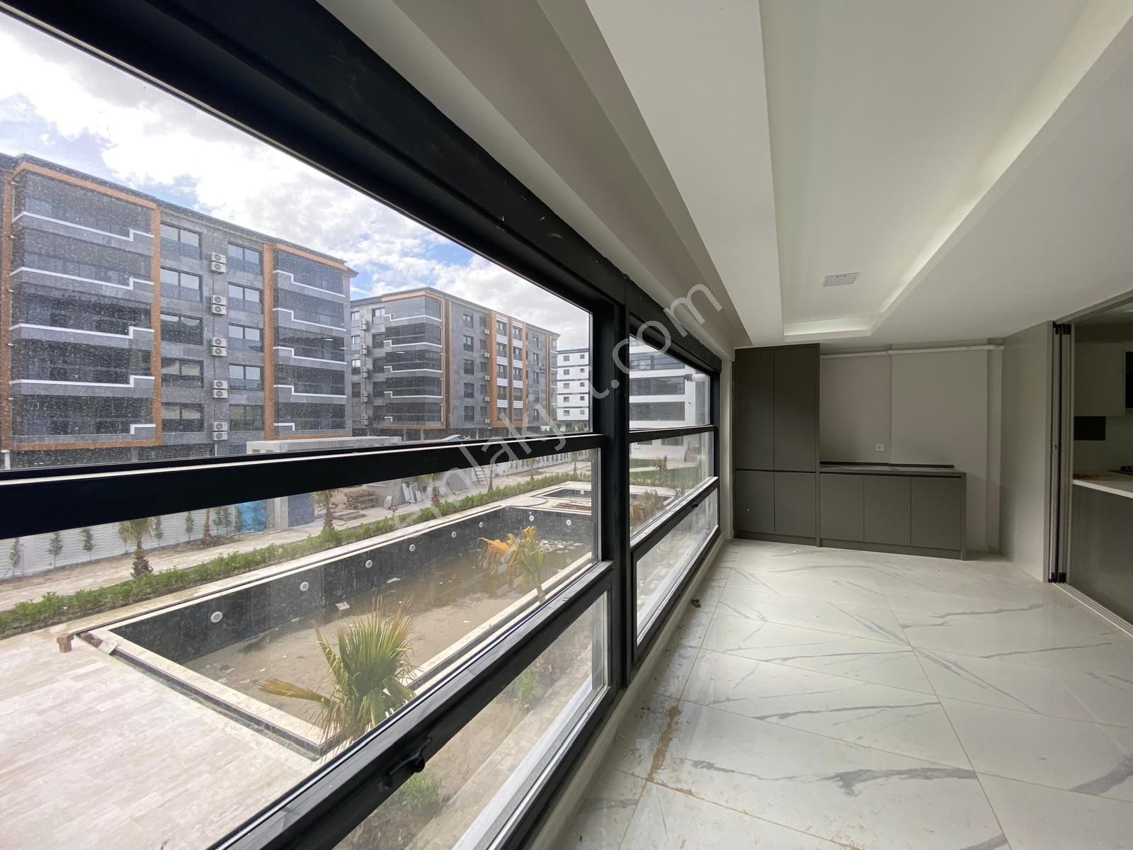 Torbalı Alpkent Mah. Havuzlu Sitede 165m2 3+1 Süper Lüx Daireler Satılıktır