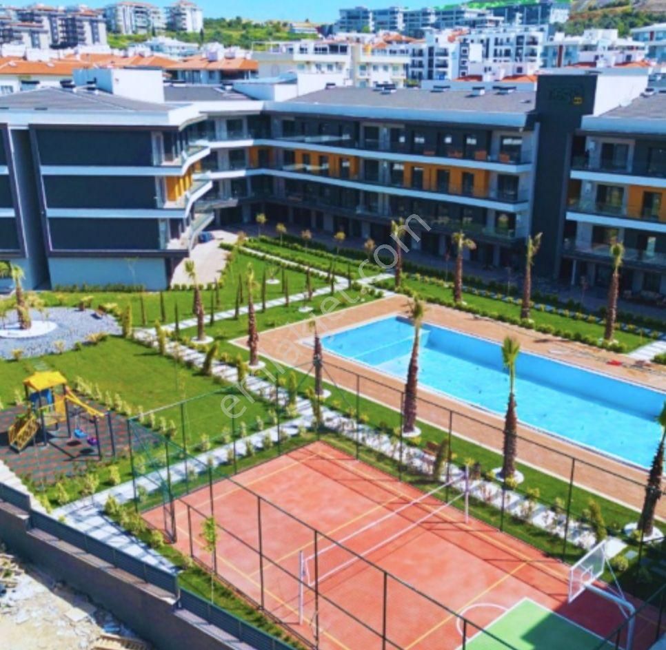 Kuşadası Değirmendere'de Net 100m2 1+1 Daireler