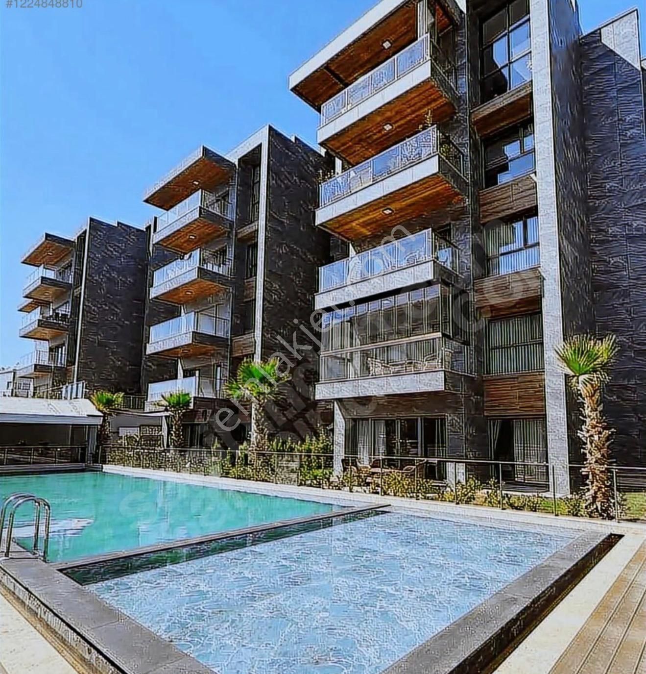 Kuşadası Ege Mahallesinde Açık Kapalı Havuzlu Sosyal Donatılı Sitede Satılık Sıfır 2+1 Daire