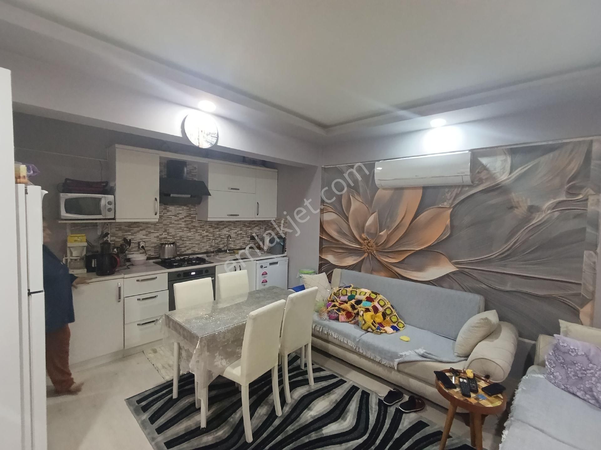 Kuşadası Davutlar Merkezde Satılık Bahçeli 2+1 Daire