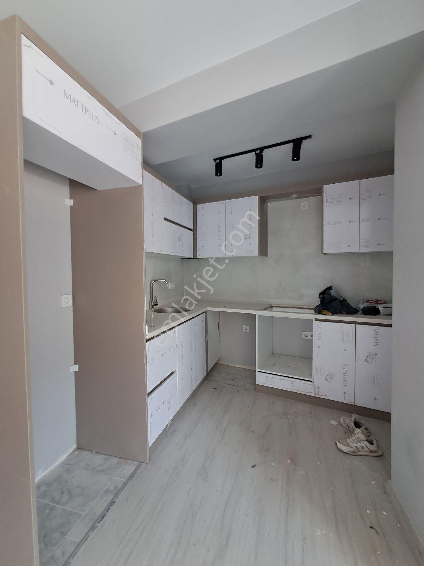 Ortaca Cumhuriyetde Sıfır 1+1 Satılık Daire.