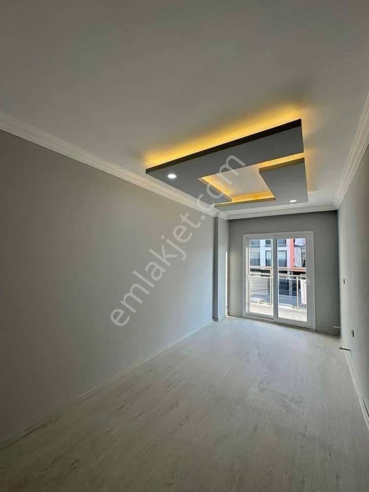 Kuşadası Davutlar Merkezde 2+1 Sıfır Bina 1.kat Asansörlü Fırsat Daire