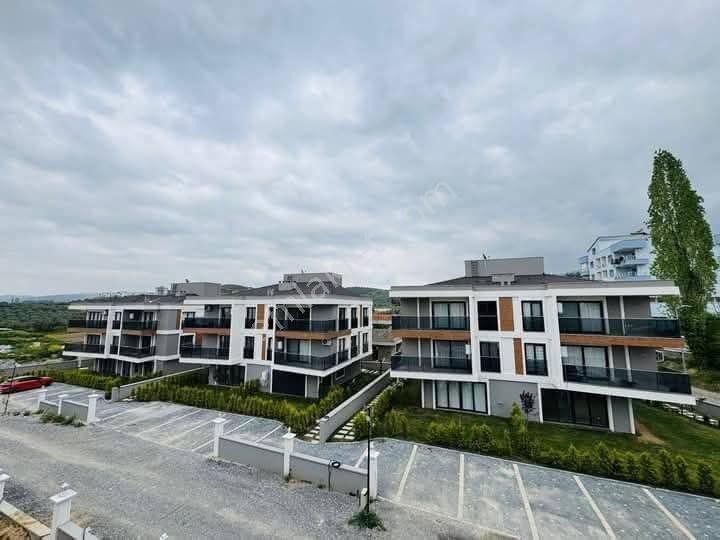 Kuşadası Davutlar Merkez'de 3+1 Sıfır Daire Havuzlu Otoparklı Site İçinde Yeni Yapı Satılık Daire