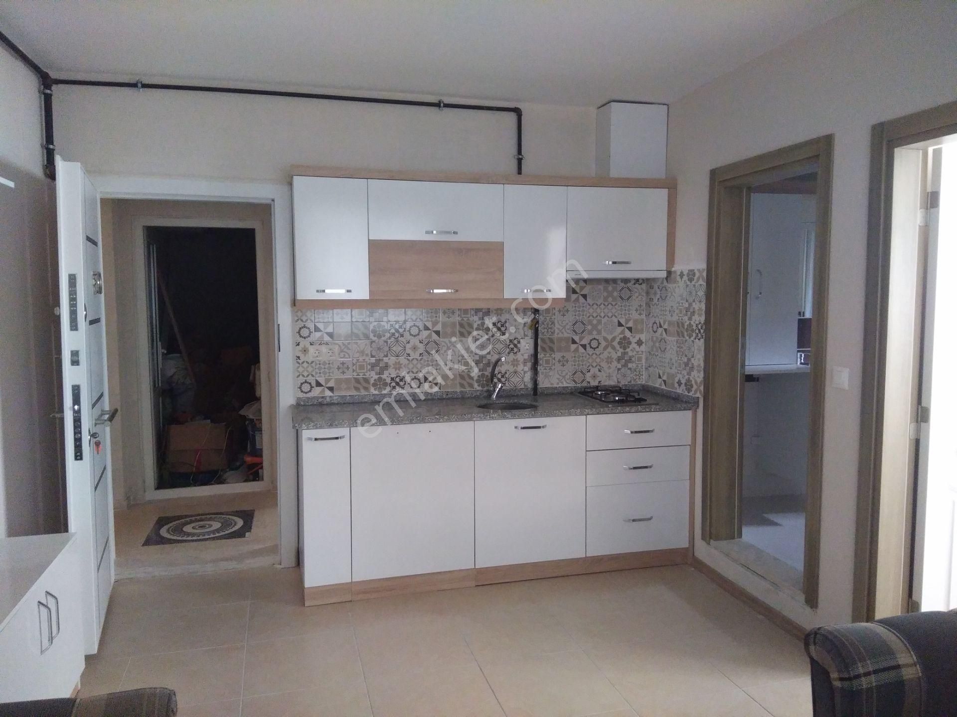 Ender Uysal Gayrimenkulden Asmalıevlerde Kiralık 1+1 Bahçe Katı Geniş Apart...