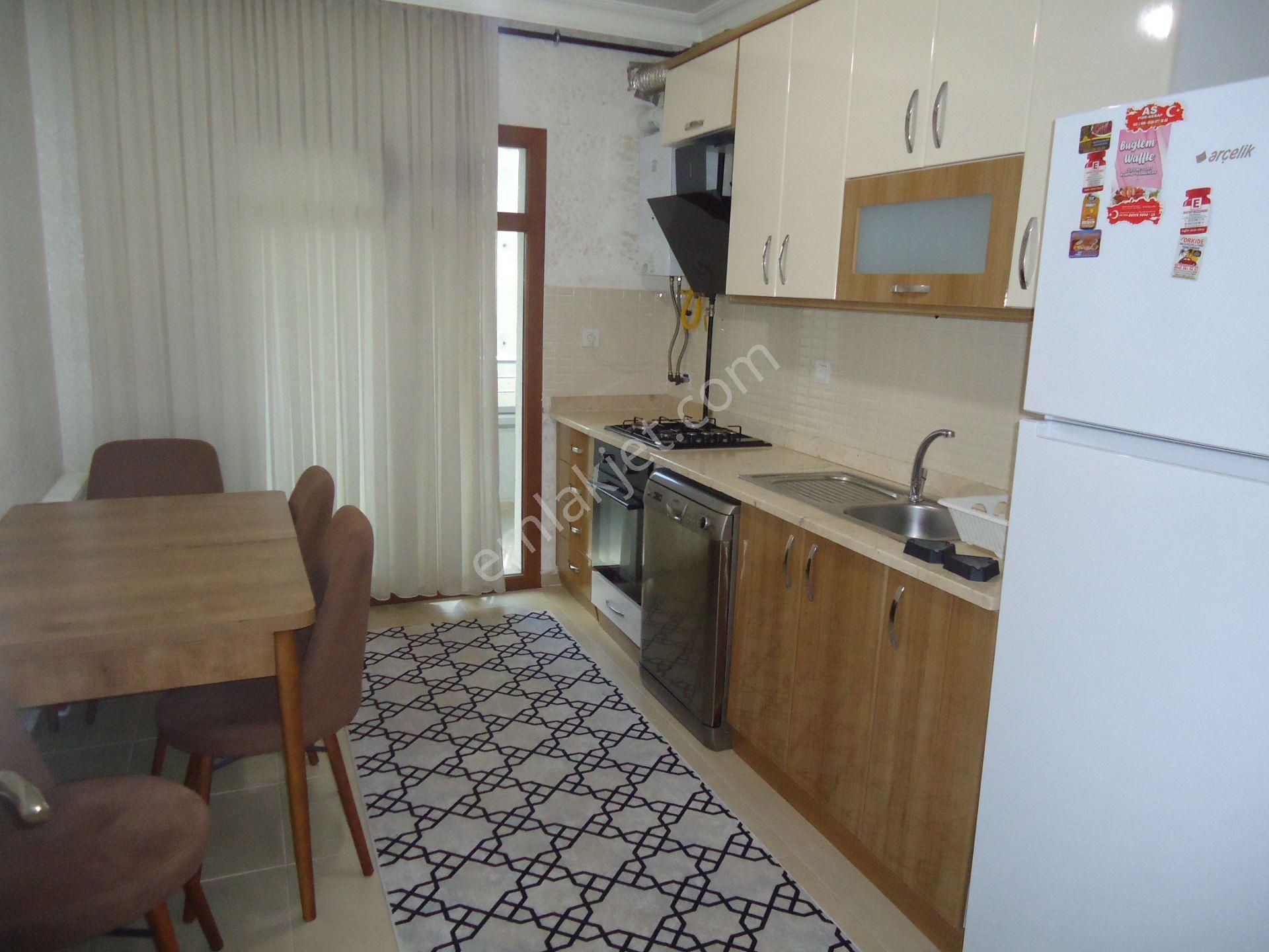Krc'den Uzun Bloklarda Katta Eşyalı Kiralık 3+1 Daire