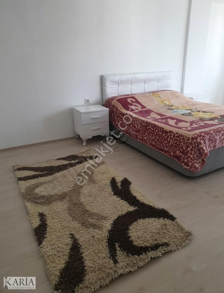Karia Gayrimenkul'den Dalamanda Havuzlu Kiralık 2+1 Eşyalı Daire