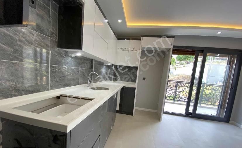 Kuşadası'nda Sıfır 1+1 Yerden Isıtmalı Satılık Daire