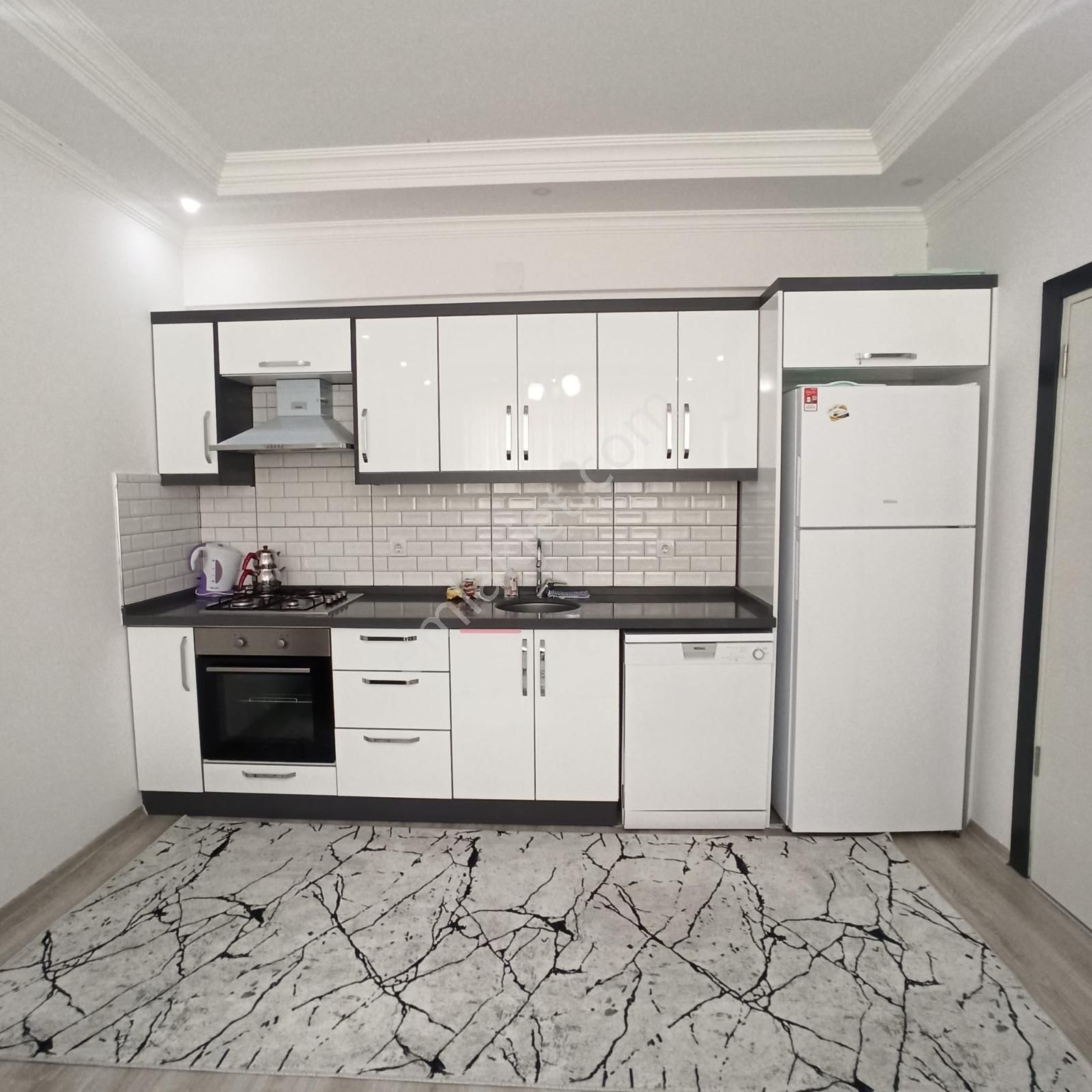 Çiğdem Emlak'tan Dalaman'da Havuzlu Sitede Satılık Daire