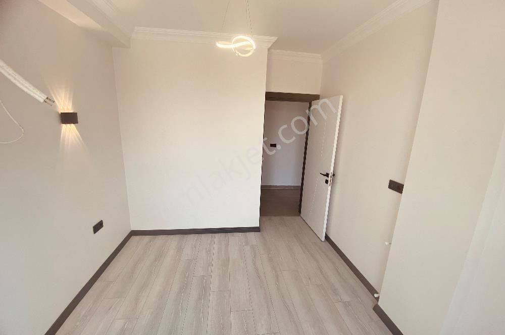 Didim, Hisar Mahallesi'nde Panoramik Deniz Manzaralı – Ön Cephe Sıfır 2+1 Daire - Görsel 16